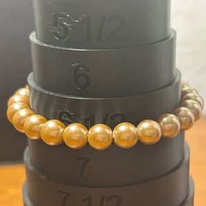 5/25$ Elegant Gold Pearl Bracelet